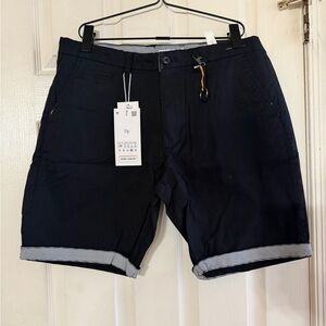 New Men’s Denim & Flower Shorts.  Size: 34.  Orig. $48